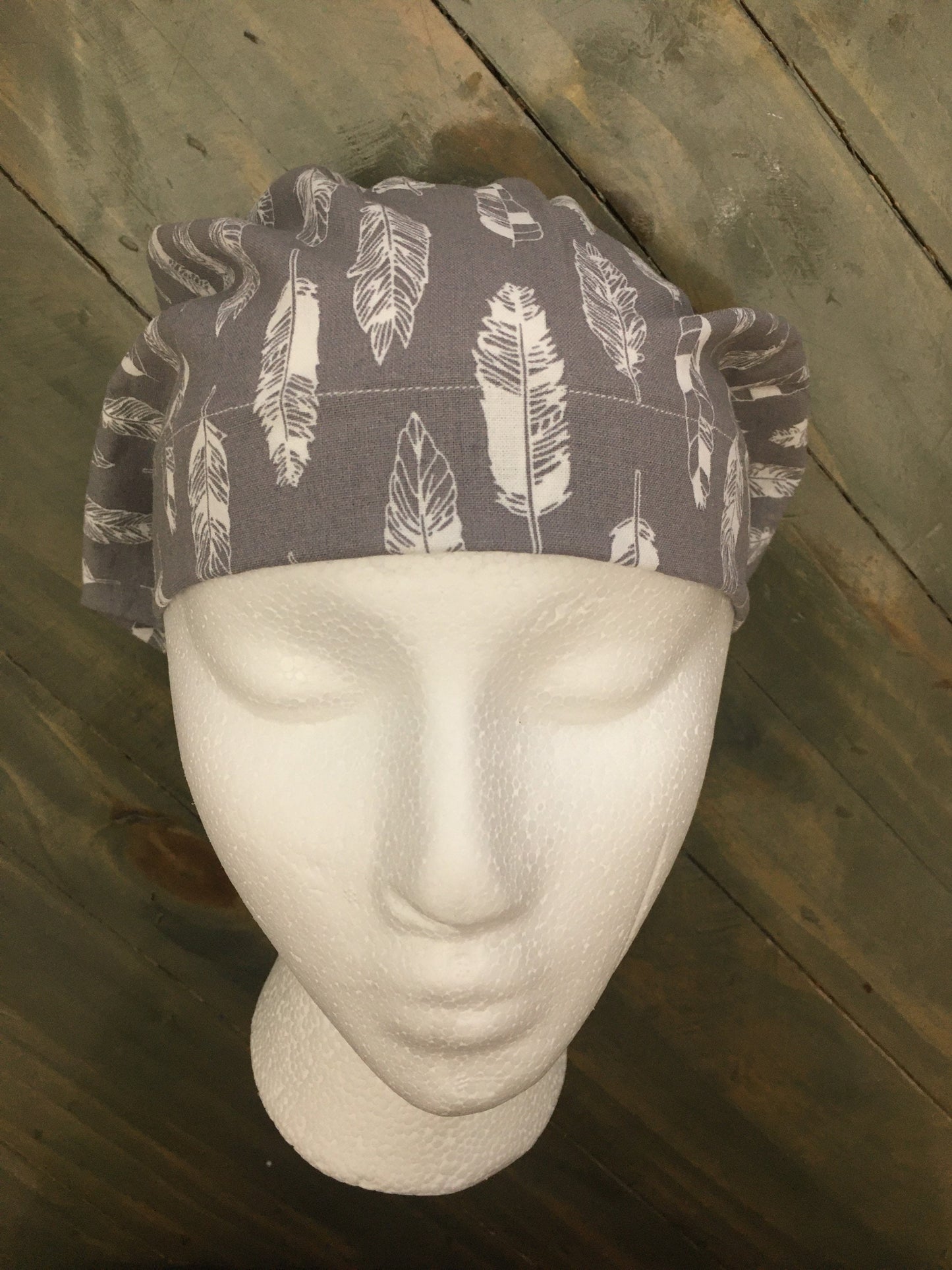 Feathers on grey euro/bouffant style surgical hat
