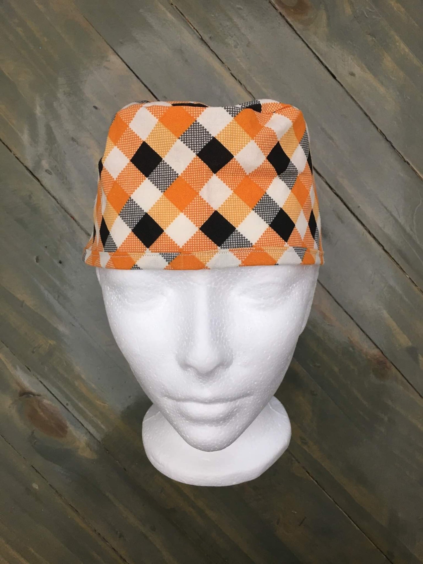 Orange argyle surgical hat