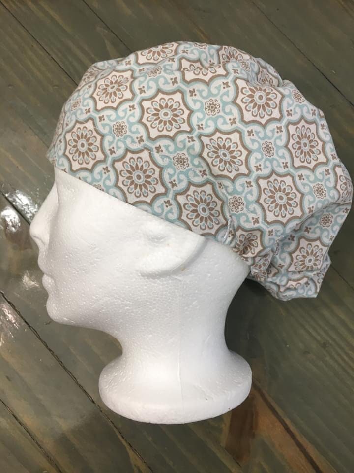 Brown/blue geometric bouffant/euro style surgical hat