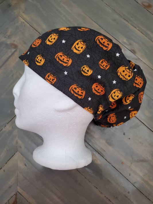 Glow in the dark stars and pumpkin bouffant/euro style surgical/scrub/dental hat by Carolinadreamsbyjen